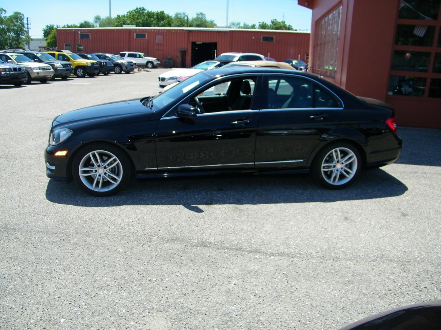 2013 Black /Black Mercedes-Benz C-Class C250 Sport Sedan (WDDGF4HB1DR) with an 3.0L V6 DOHC 16V engine, 7-Speed Automatic transmission, located at 4000 Bee Ridge Road, Sarasota, FL, 34233, (941) 926-0300, 27.298664, -82.489151 - Photo#2